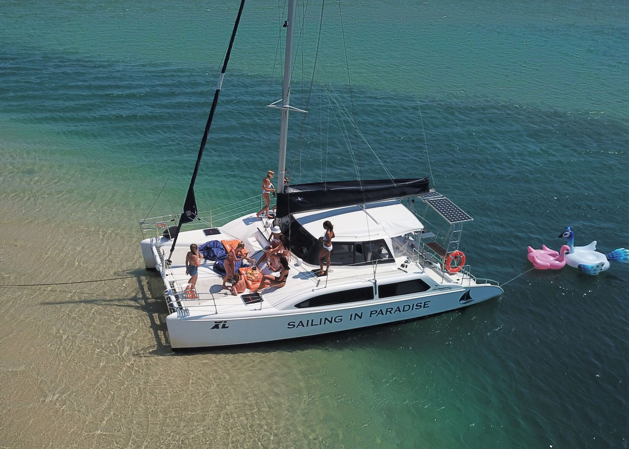 Seawind 1000XL beach landing at Wave Break Island, surrounded by crystal clear waters of the Gold Coat Broadwater